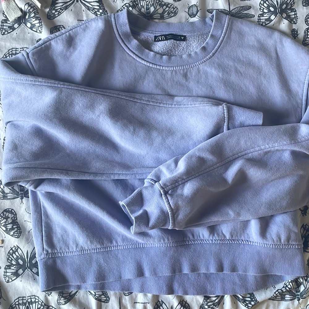 sweater, keeps me warm, no damages. (it runs on petite woman. ) or kids.